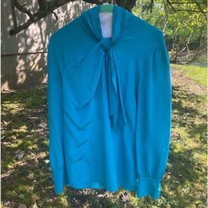 PRADA BLOUSE size small slight discoloration under arm’s but otherwise perfect